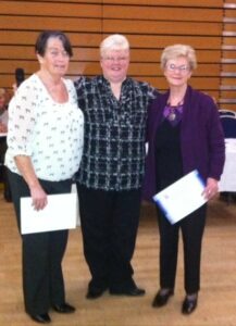 Jeanette & Irene receive their certificates from Christine Lacey MBE